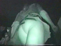 The turning on and enticing club upskirt was recorded in darkness featuring hot long legs and half nude ass up the skirt